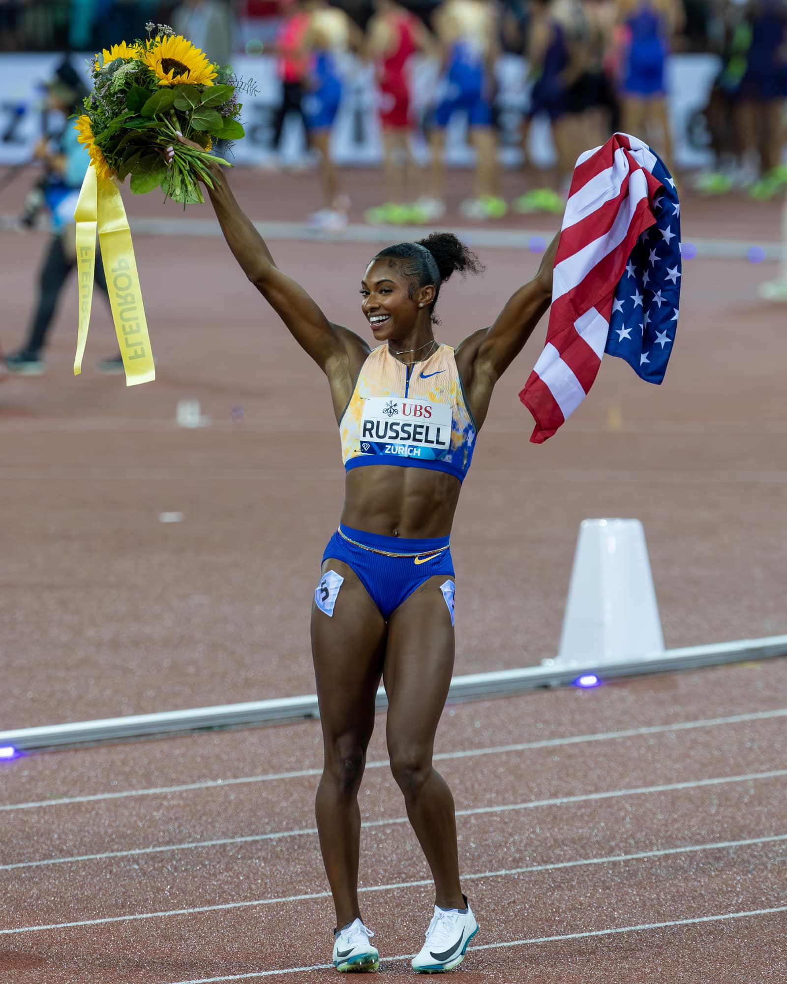 Russell Wins First Ultimate 100m Hurdles Title in 12.22
