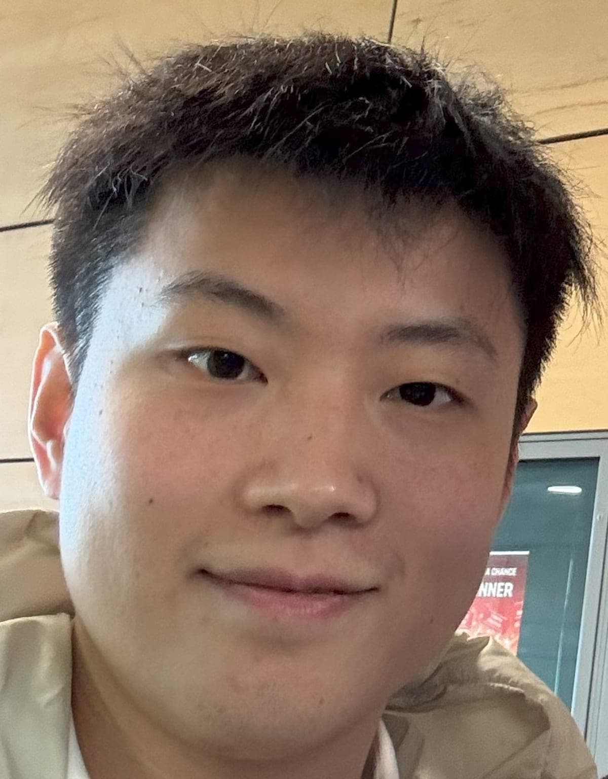 Zhao, First Chinese World Champion, Reaches Quarterfinals