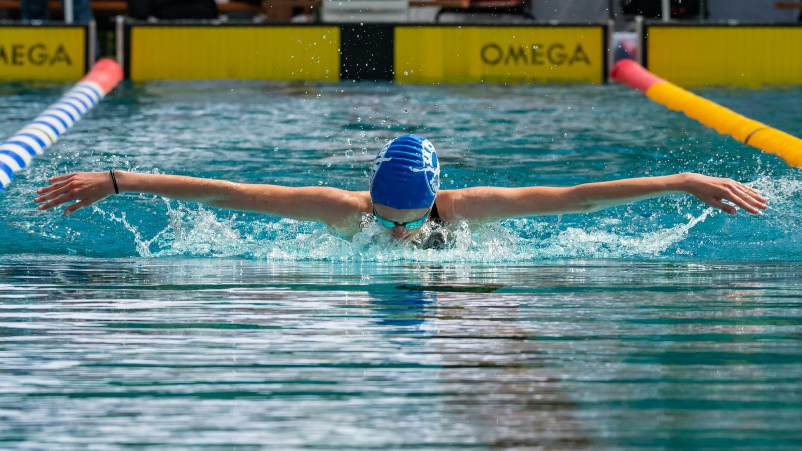 McIntosh Breaks 200m Butterfly World Record at 2:01.65